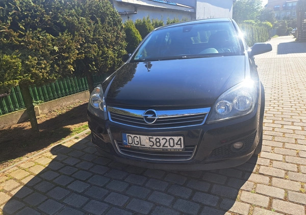 Opel Astra cena 8000 przebieg: 322534, rok produkcji 2009 z Szczecin małe 56